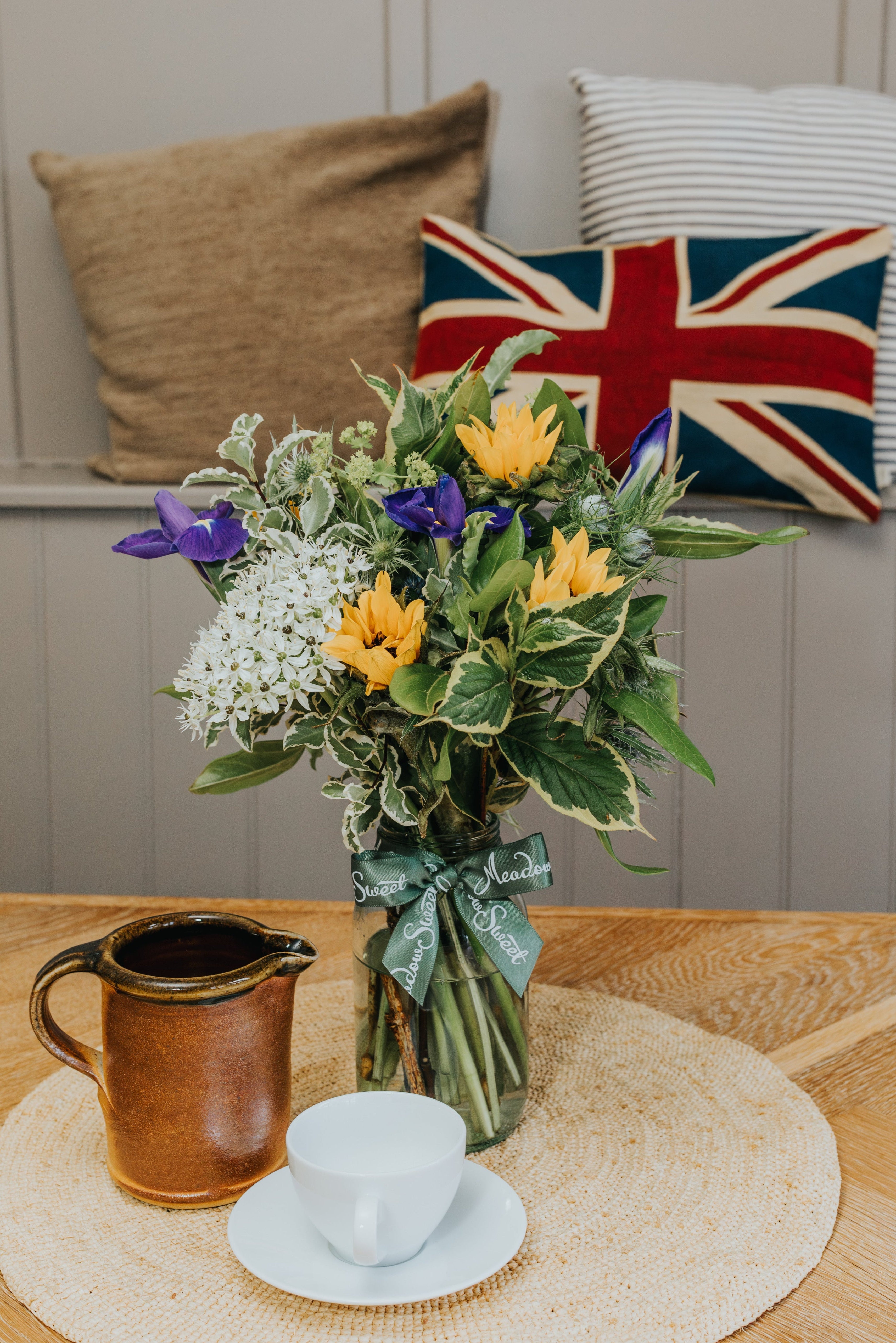 A MeadowSweet seasonal bouquet in a jar with sunflowers