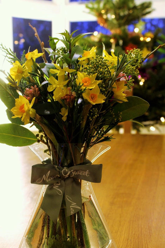 MeadowSweet seasonal posy with mini narcissi, viburnum buds, winter jasmine, bay leaves, rosemary, willow twigs, waxflower foliage, cupressus, ruscus and skimmia buds.