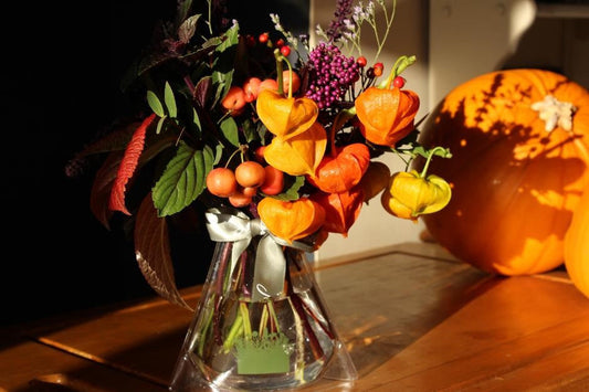MeadowSweet seasonal posy with: physalis, crab apples, purple basil, colour-change hydrangea leaves, callicarpa (or beautyberries), eucalyptus, rosehips, limonium.