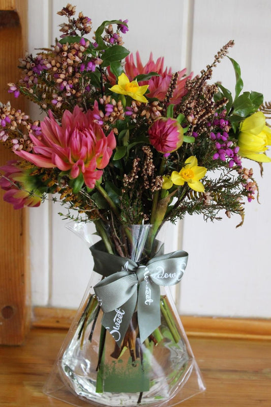 MeadowSweet seasonal posy with dahlias and heathers mixed with sweet-smelling narcissi.