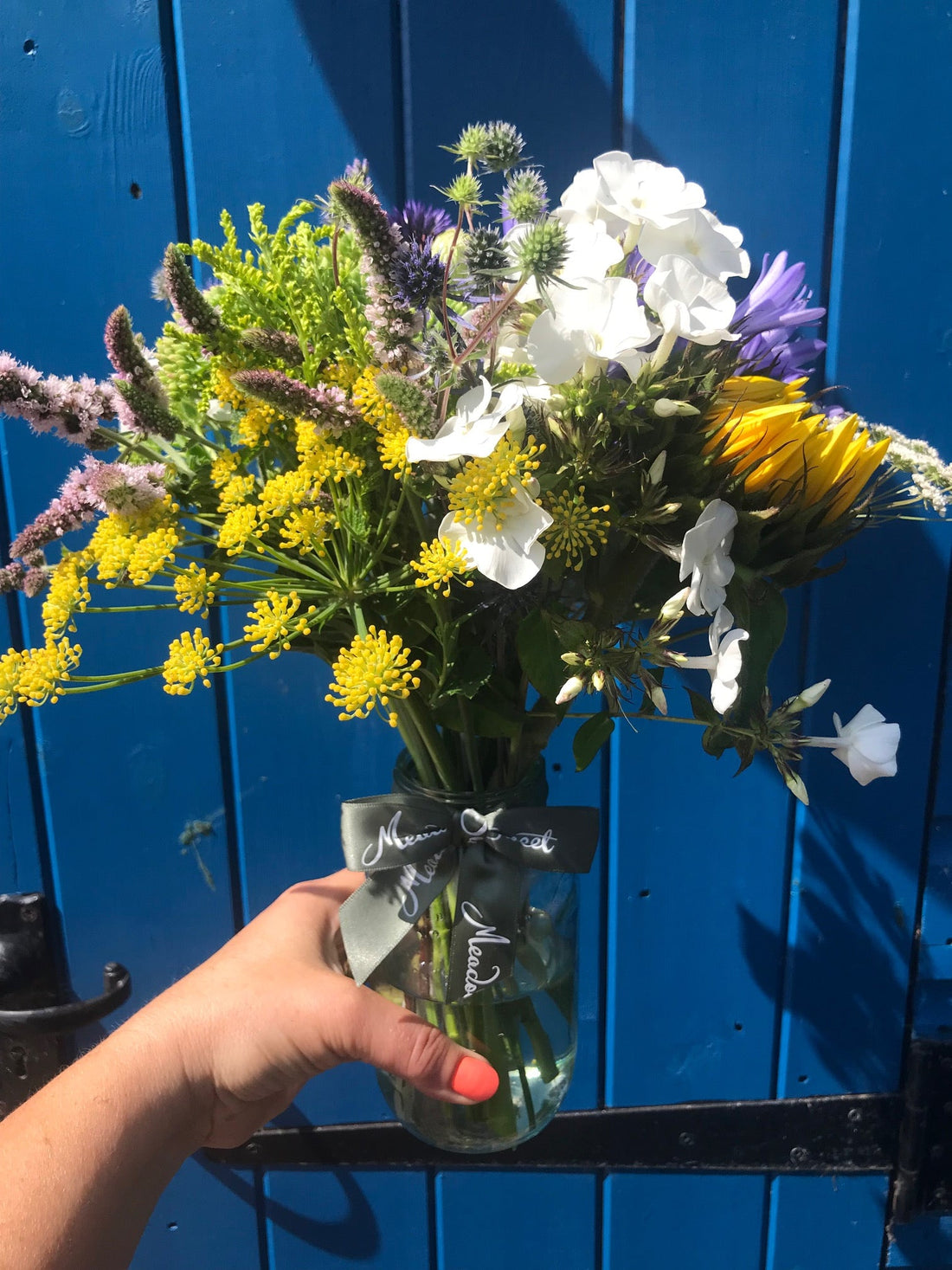 Yellows and blues in this summer celebration of British flowers