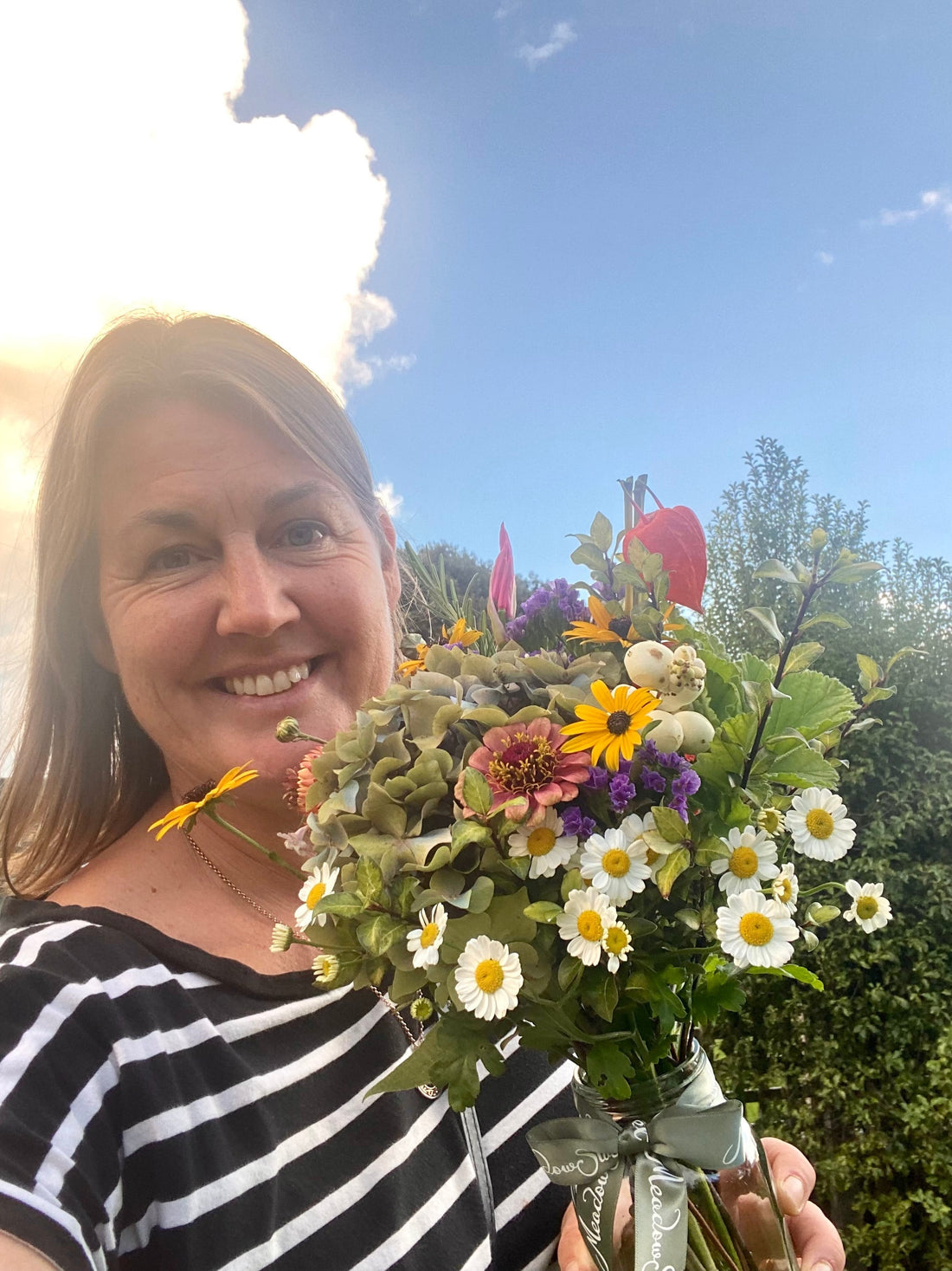 Sophie Townsend from MeadowSweet posies with bunch of British-grown flowers
