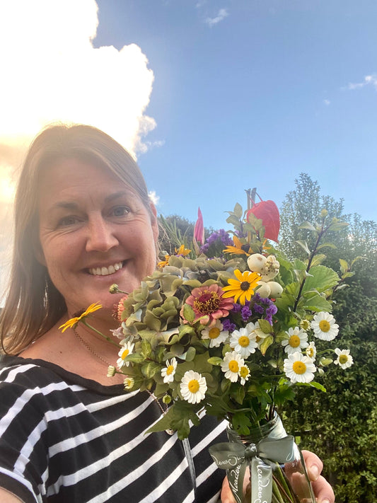 Sophie Townsend from MeadowSweet posies with bunch of British-grown flowers