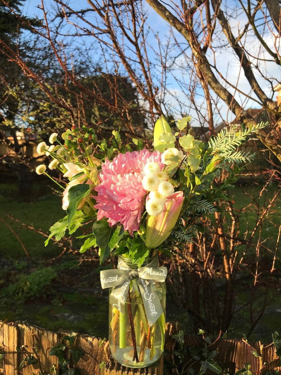 December British-grown flowers in a glass jar