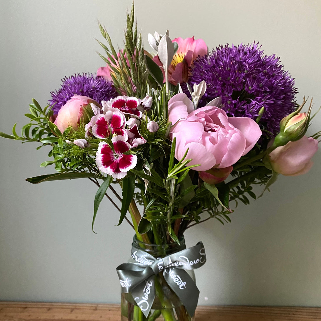 British early summer flowers including peonies and allium