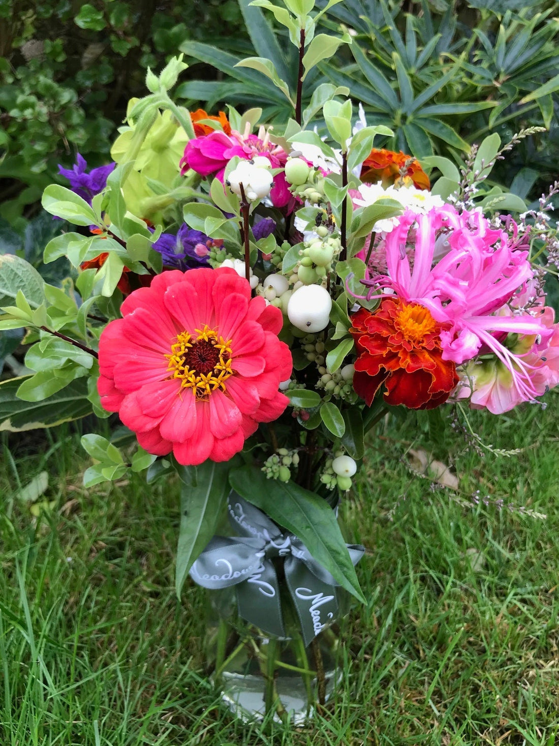 Homegrown nerines and zinnias in this autumn posy