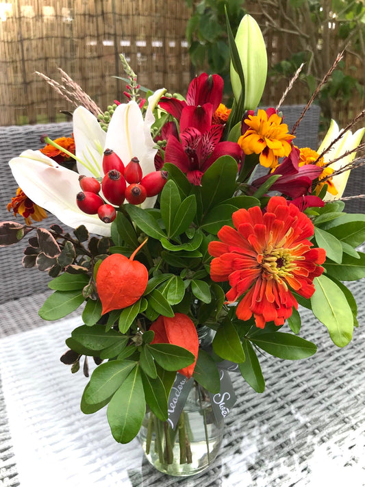 British autumn colour flowers and Chinese lanterns for Halloween themed posy