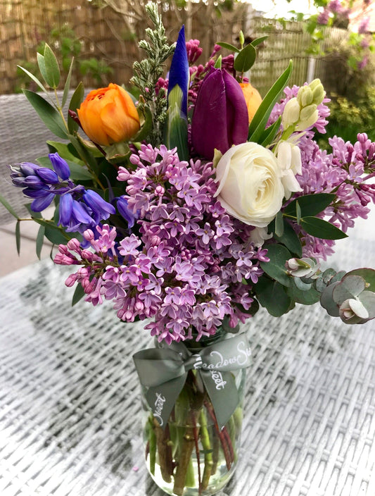April locally grown flowers in a glass jar