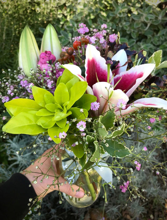 British grown lilies and gypsophila posy in a glass jar