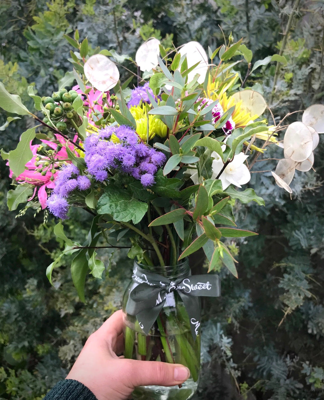 British ageratum and other seasonal flowers in this MeadowSweet flower posy