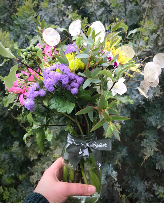 British ageratum and other seasonal flowers in this MeadowSweet flower posy