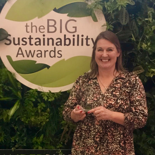 A happy Sophie Townsend receiving the winning sustainability award