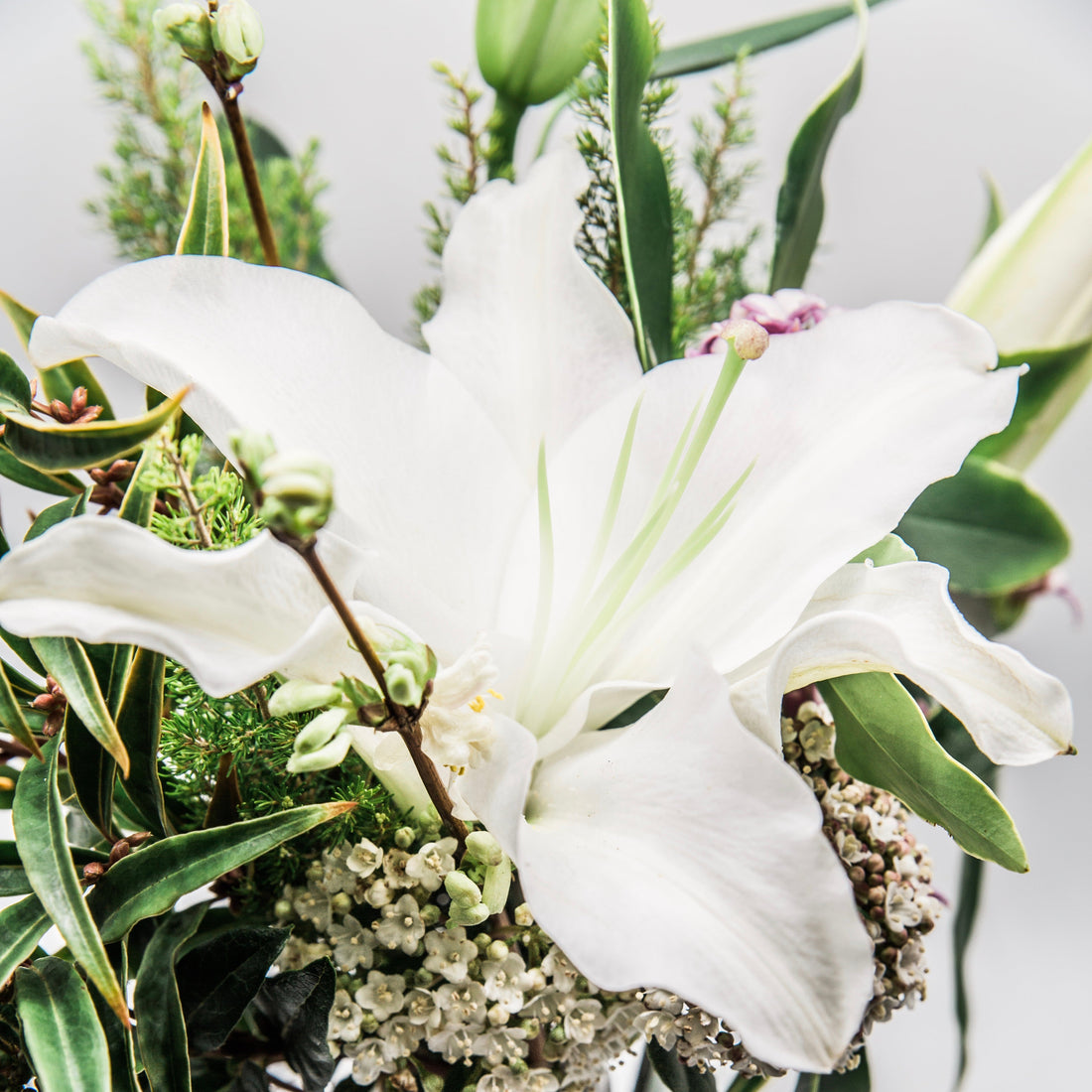 British seasonal flower posy Winter flowers including white British grown lily