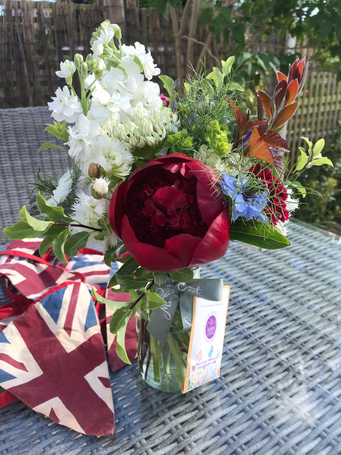 British seasonal flowers in red, white and blue for the Queen's Platinum Jubilee