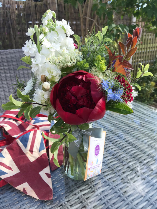British seasonal flowers in red, white and blue for the Queen's Platinum Jubilee