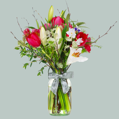 British Grown Winter Flower Posy with tulips lilies and paperwhites In Glass Jar 