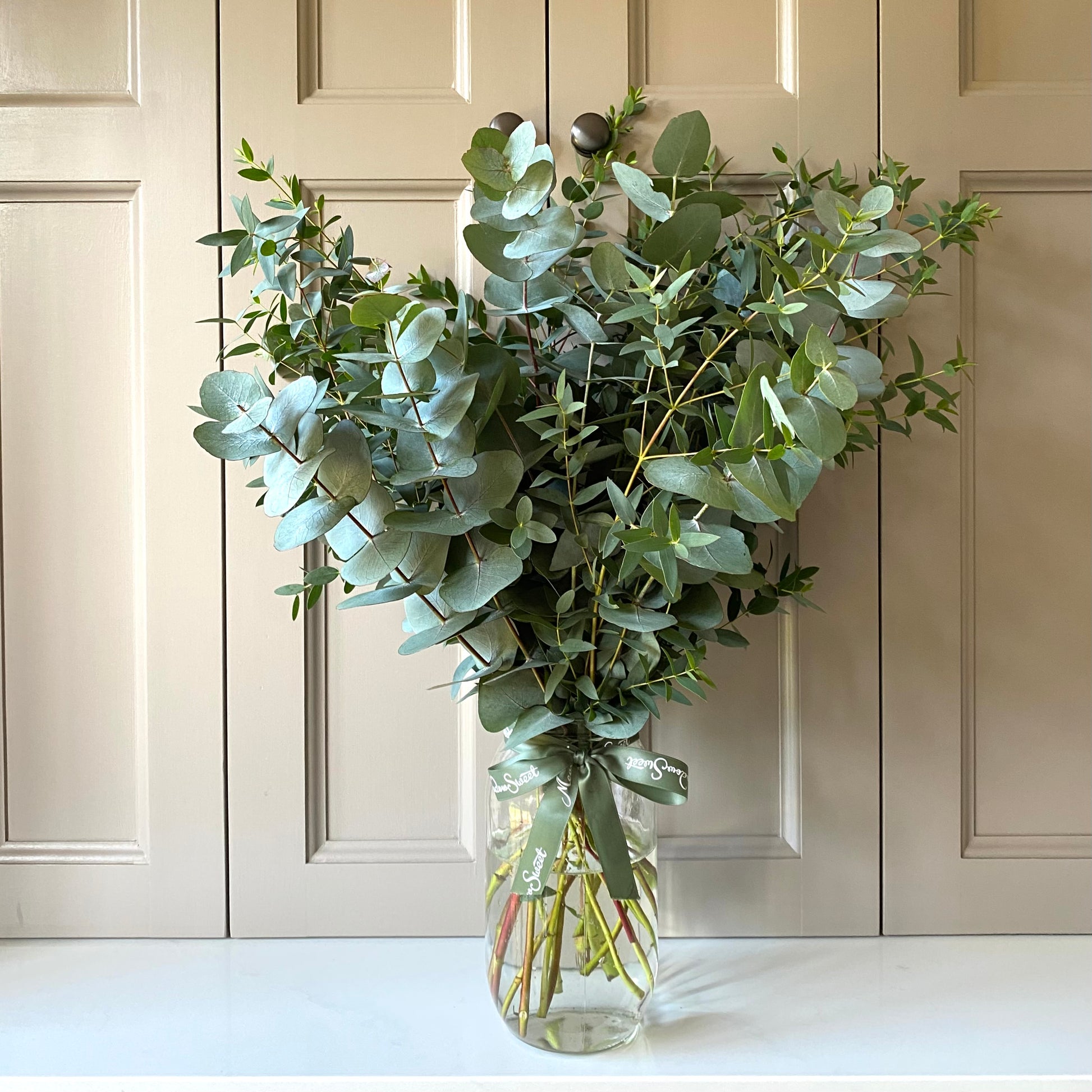 luxury bouquet of British-grown eucalyptus in a large glass jar