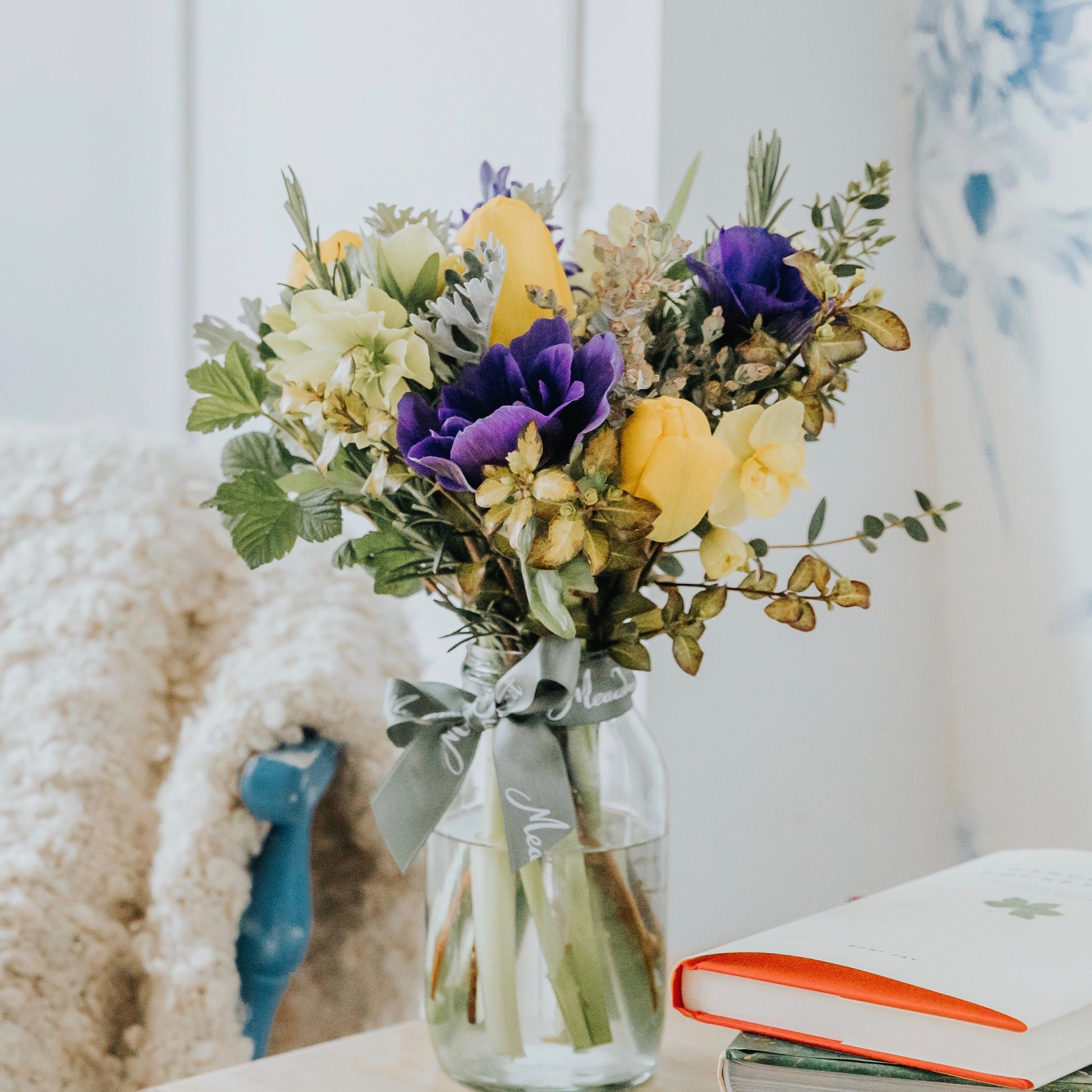 Yellow and blue British seasonal flower posy flower subscription service.